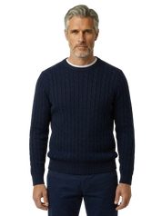 Maglia treccia