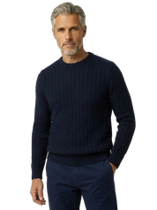 Maglia treccia